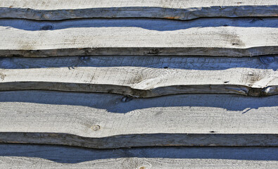 Grey planks and shadows