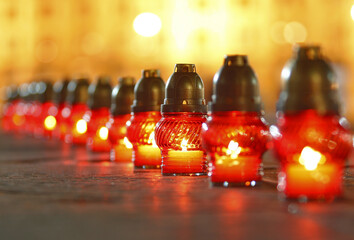 candles placed in line on a street. background