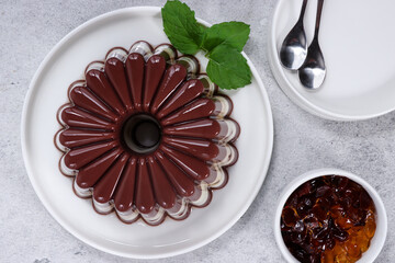Puding Coklat Vanila. Chocolate and vanilla puddings are a desserts with chocolate  and vanilla flavors topping with jelly pearls. 