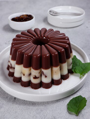 Puding Coklat Vanila. Chocolate and vanilla puddings are a desserts with chocolate  and vanilla...