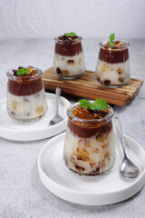 Puding Coklat Vanila. Chocolate and vanilla puddings are a desserts with chocolate  and vanilla flavors topping with jelly pearls. 