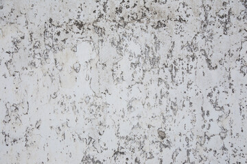 Fototapeta premium old brick wall with layers of old plaster and paint, background