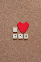 I love you wooden letters on cork board red heart