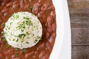 A top down view of a bowl of red beans and rice.