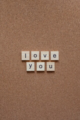 love you wooden letters on cork board