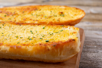 A closeup view of garlic bread.