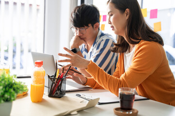 group of business people talking about project and prepare pizza and potato chips for having lunch in corporate together in office.