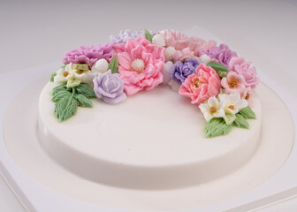 Obraz na płótnie Canvas Sweet Colourful Flowers Milk jelly cake, Beautiful flower shaped coconut milk jelly cake.