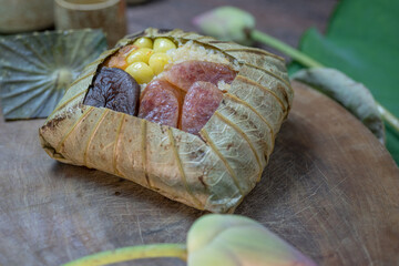 Steamed Rice in Lotus Leaf with Taro, Shiitake Mushroom, Ginkgo, Pumpkin, Chinese Sausage and...