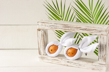 Easter Bunny ears made from napkins and eggs. Festive decoration for holiday