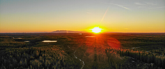 Sunset Alaska sleeping lady and swamps ball of fire