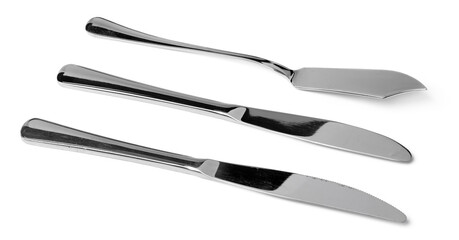 Set of silver dining knives isolated on white