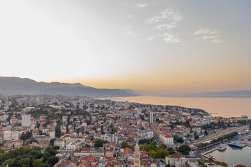 Obraz premium Aerial drone shot of Split city in sunrise hour with view of Mount Morso in Croatia