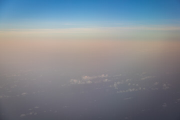 Beautiful blue sky with clouds shoot on airplane
