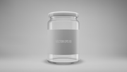 Glass jam jar with a lid. A transparent jar with a white lid and label.