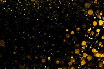 Naklejka premium Gold and yellow bokeh of light textured glitter