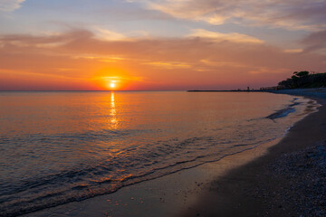 Obraz premium sunset on the beach in Tuscany, Italy.
