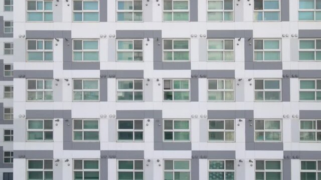 Building of a residential complex close-up, urban geometry.