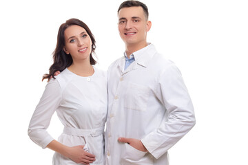 People in Medicine. Portrait of Two Positive Caucasian Doctors in White Smocks Posing Together Embraced Against White.