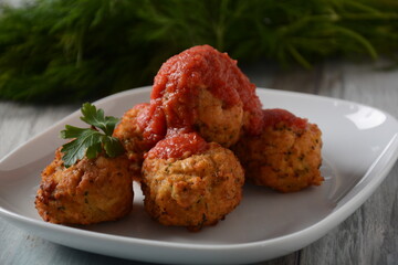 Fried fish meatballs with  parsley