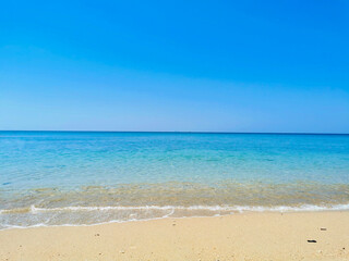 Fototapeta na wymiar Beautiful view of white sand with blue sea at Lanta island, Krabi, Thailand.