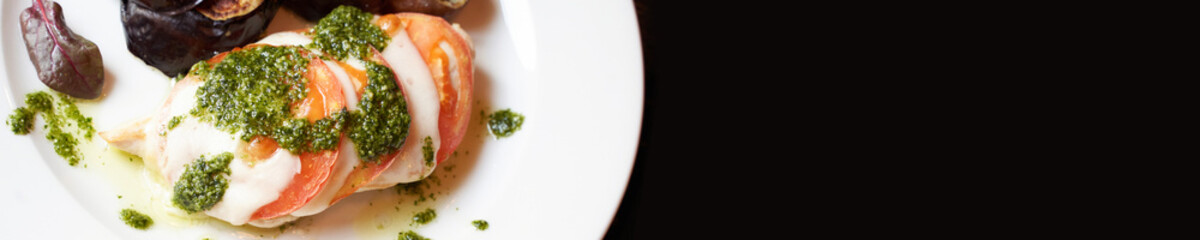 Summer healthy food. Cheese, tomato, basil and eggplant reciepe. Mozzarella sliced oven. Homemade dinner. Cafe italian meal. Diet cooked lunch. Horizontal banner. Copyspace
