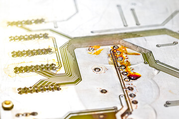 Macro Shoot of Empty Used Printed Circuit Board with Flux Residues and Metallization Circuitry for...