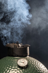 Steam coming out from an egg type grill