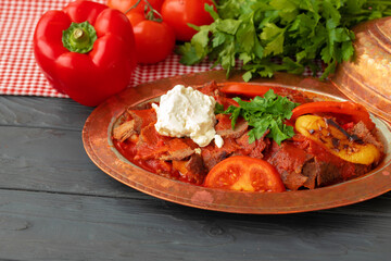 Turkish Meat Saute with vegetables in copper plate