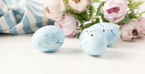 Easter painted eggs isolated on trendy blue background. The minimum concept of Easter.