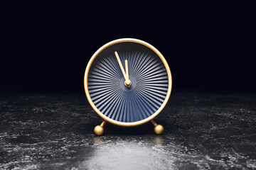 Alarm clock on black background