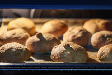 Warm and fresh homemade bread rolls. Food background