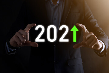 Plan business positive growth in year 2021 concept. Businessman plan and increase of positive indicators in his business, Growing up business concepts.