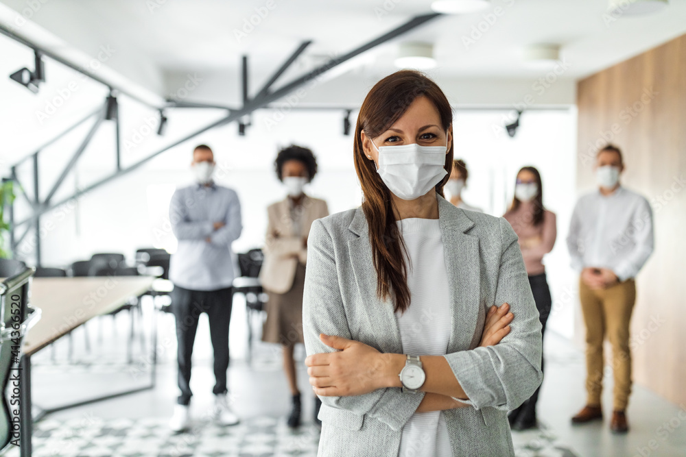 Wall mural business group of people, standing behind female boss.