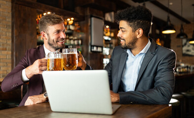Handsome two businessmen have a meeting in a restaurant