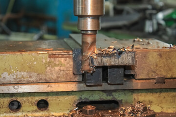 Metal processing on a milling machine close-up. Small-scale industry in Russia