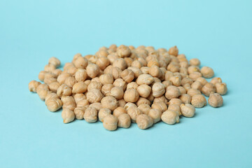 Group of fresh chickpea on blue background