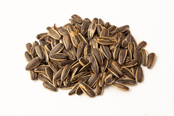 Pile of Sunflower seeds isolated on a white background.