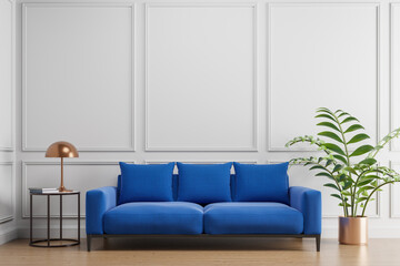 Fresh cozy modern classic interior with white walls, blue sofa, coffee table, wood floor and plant.