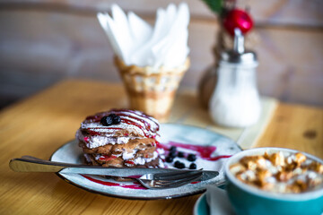 Sugar dessert pan cakes with berries and jam. Breakfast  concept