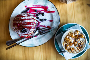 Sugar dessert pan cakes with berries and jam. Breakfast  concept