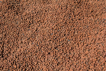 Expanded clay for construction dumped in a pile.