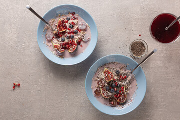 Healthy breakfast with oatmeal and fruit, top view