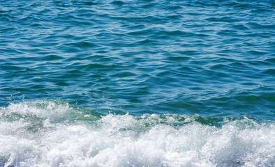 Soft wave of sea on sandy beach. Background.