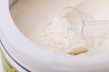 Obraz na płótnie Canvas white protein powder in jar