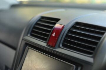 Fototapeta na wymiar Closeup emergency stop button in car