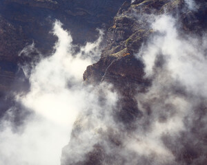 sunrays screening through high mist in betwwen the mountains of La Palma, Canary islands