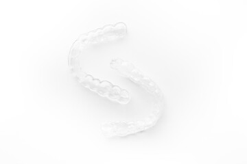 Invisible transparent aligners plastic braces dentistry retainers on white