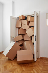 Room entrance full with cardboard boxes
