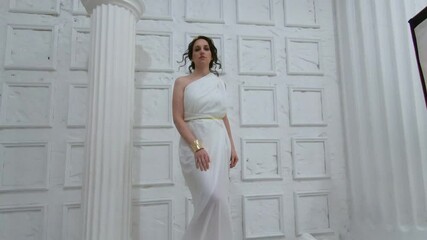 Beautiful Greek goddess woman close up on the white background.Greek style woman.2,7k
